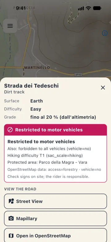View the road panel for Strada dei Tedeschi, dirt track, earth surface, Easy: Restricted to motor vehicles, forbidden to all vehicles, hiking difficulty T1, protected area Parco della Magra - Vara, and buttons for Street View and Mapillary.