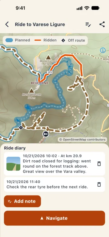 Ride diary: a note with a photo about a dirt road closed for logging and a note about the rear tyre.