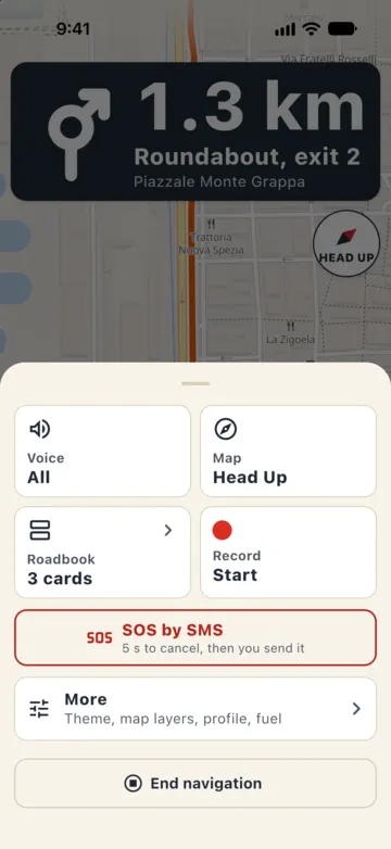 The ☰ menu while navigating: Voice All, Map Head Up, Roadbook 3 cards, Record Start, the red "SOS by SMS · 5 s to cancel, then you send it" button, More (theme, map layers, profile, fuel) and End navigation.