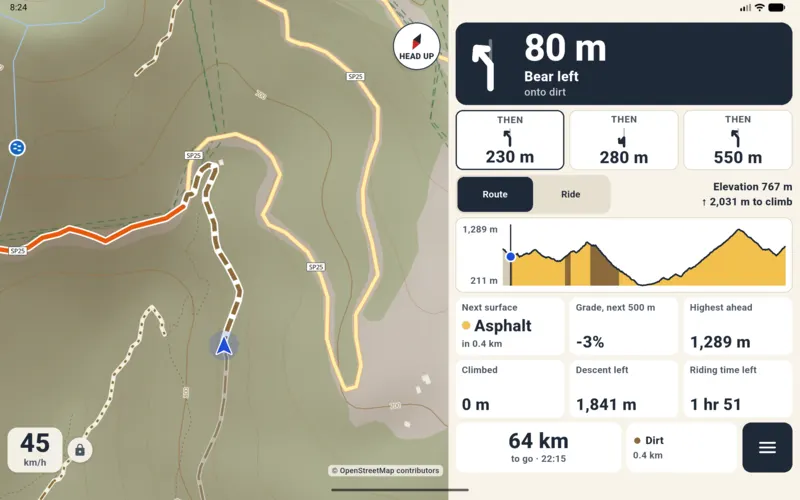 Tablet navigation with the Route chart: profile coloured by surface, elevation 767 m, 2,031 m left to climb, gradient of the next 500 m −3%.